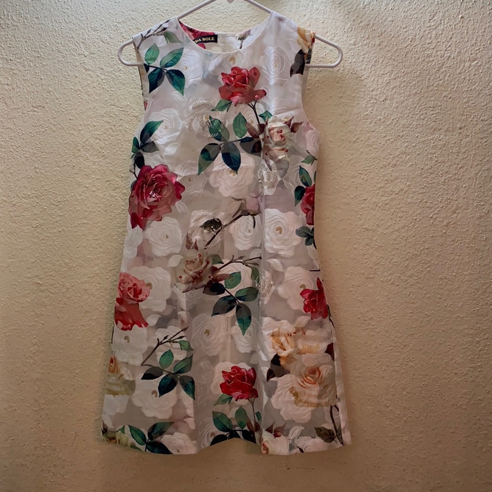 A white dress with roses